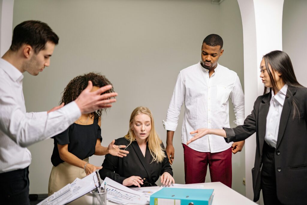 People in the middle of a meeting.
