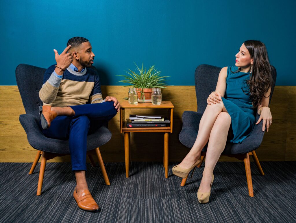 Two people talking.