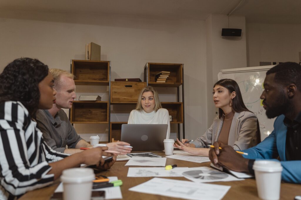 Employees in the middle of a meeting.